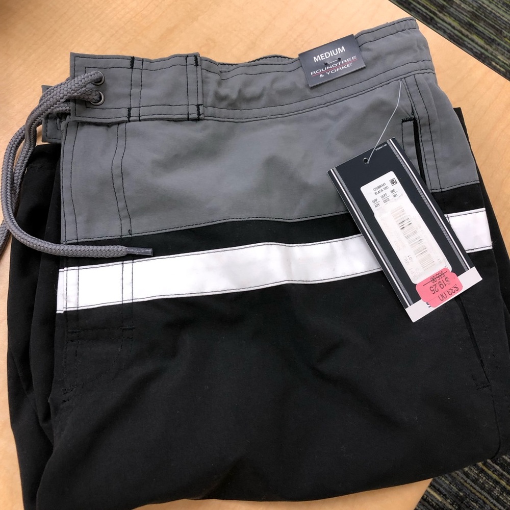New swim shorts never worn, still has tags
